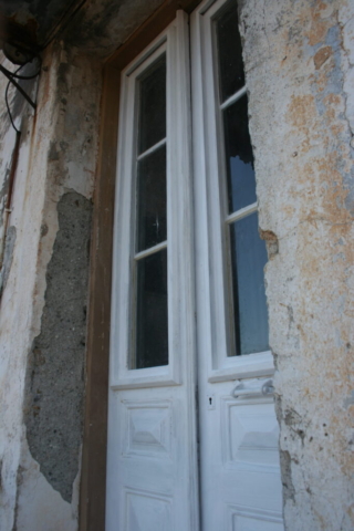 samos house plasterwork was peeling in patches everywhere